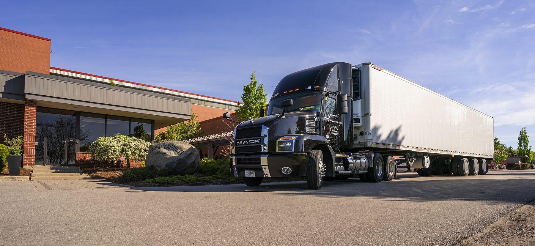 Exterior Truck Parked by Rock at E&E McLaughlin Ltd.
